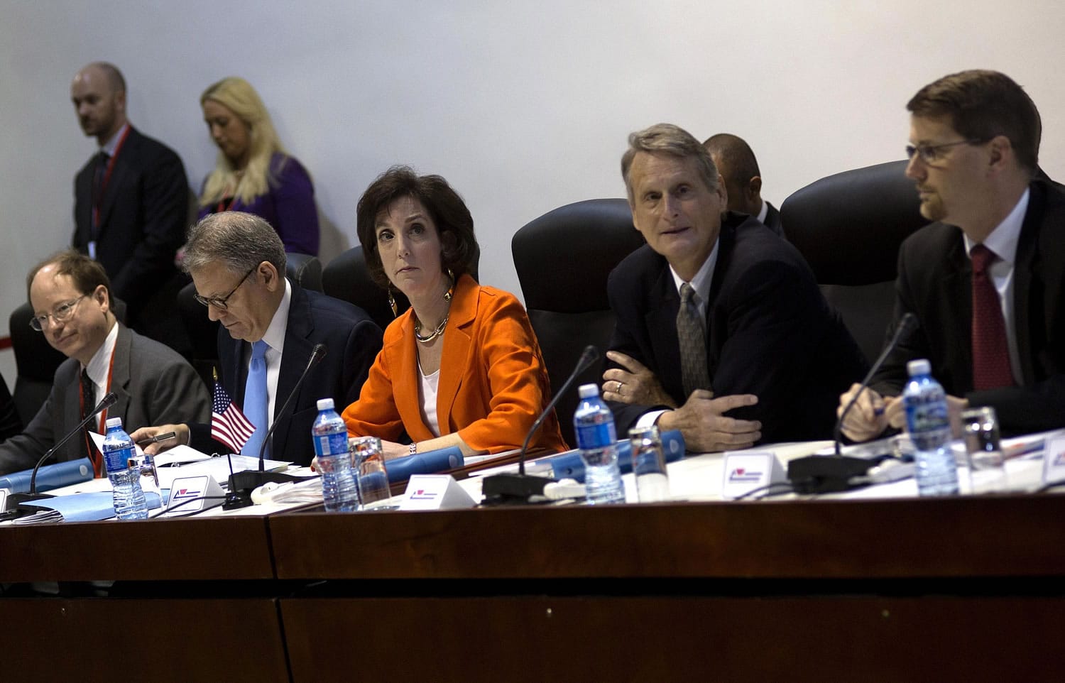 Assistant Secretary of State of the Bureau of Western Hemisphere Affairs Roberta S. Jacobson, flanked by Jeffrey DeLaurentis, second left, chief of mission at the U.S.