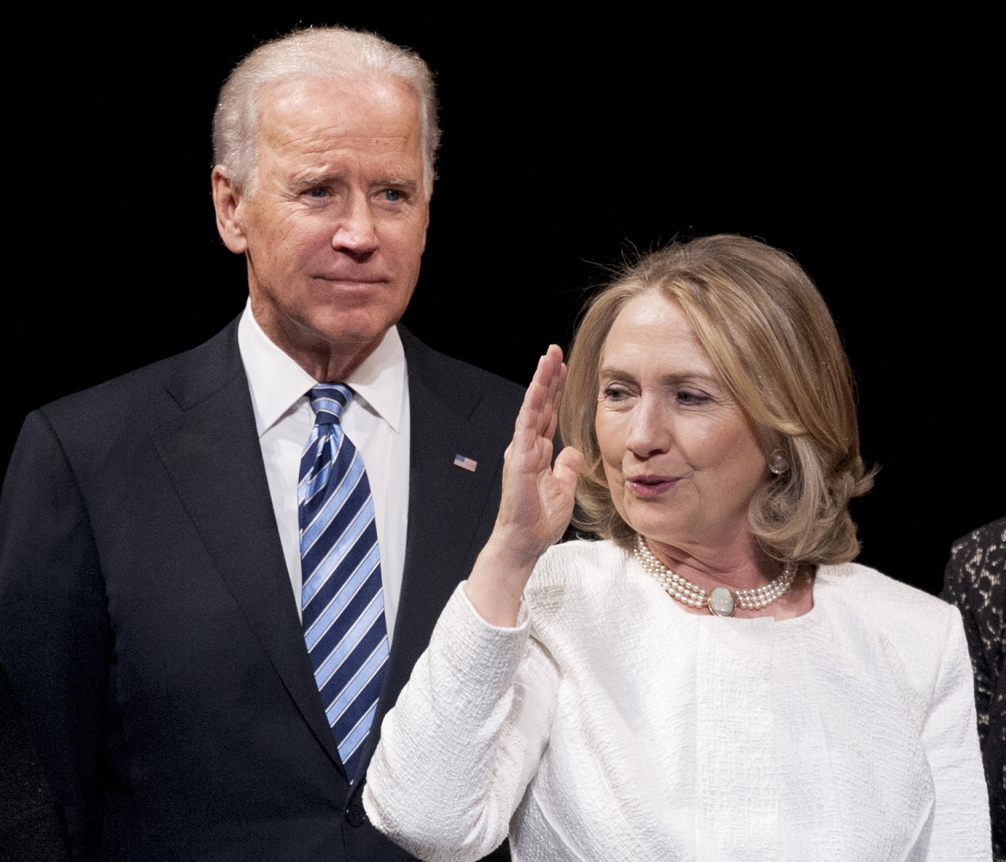 Vice President Joe Biden and former Secretary of State Hillary Rodham Clinton appear onstage at the Kennedy Center for the Performing Arts in Washington.