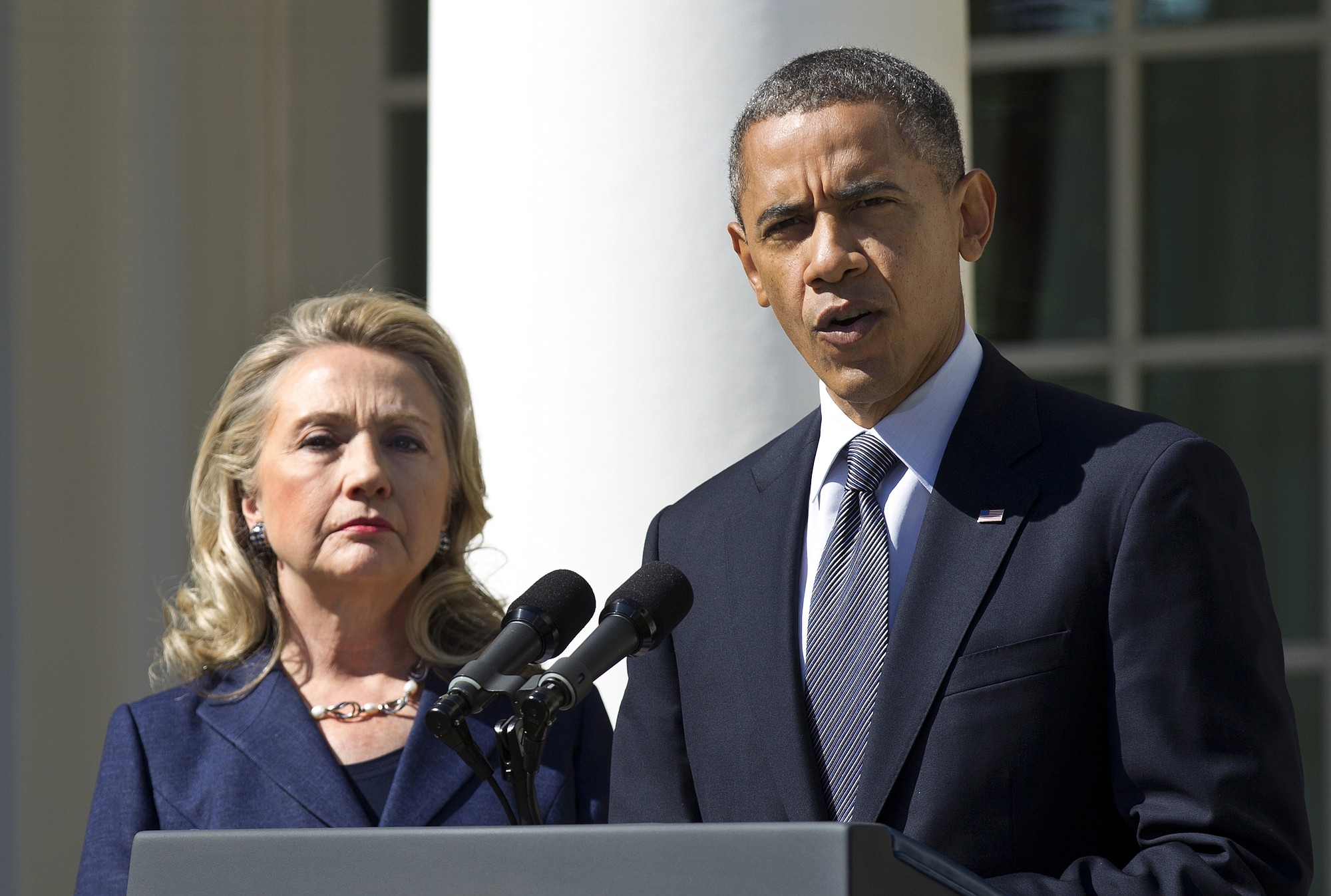 President Barack Obama, accompanied by then-Secretary of State Hillary Rodham Clinton, speaks in the Rose Garden of the White House in Washington.