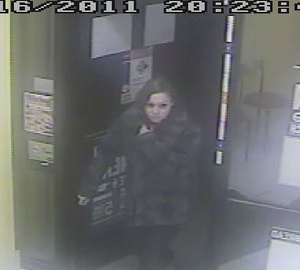 Officials released this photo of a woman who allegedly robbed a Dominos Pizza store.