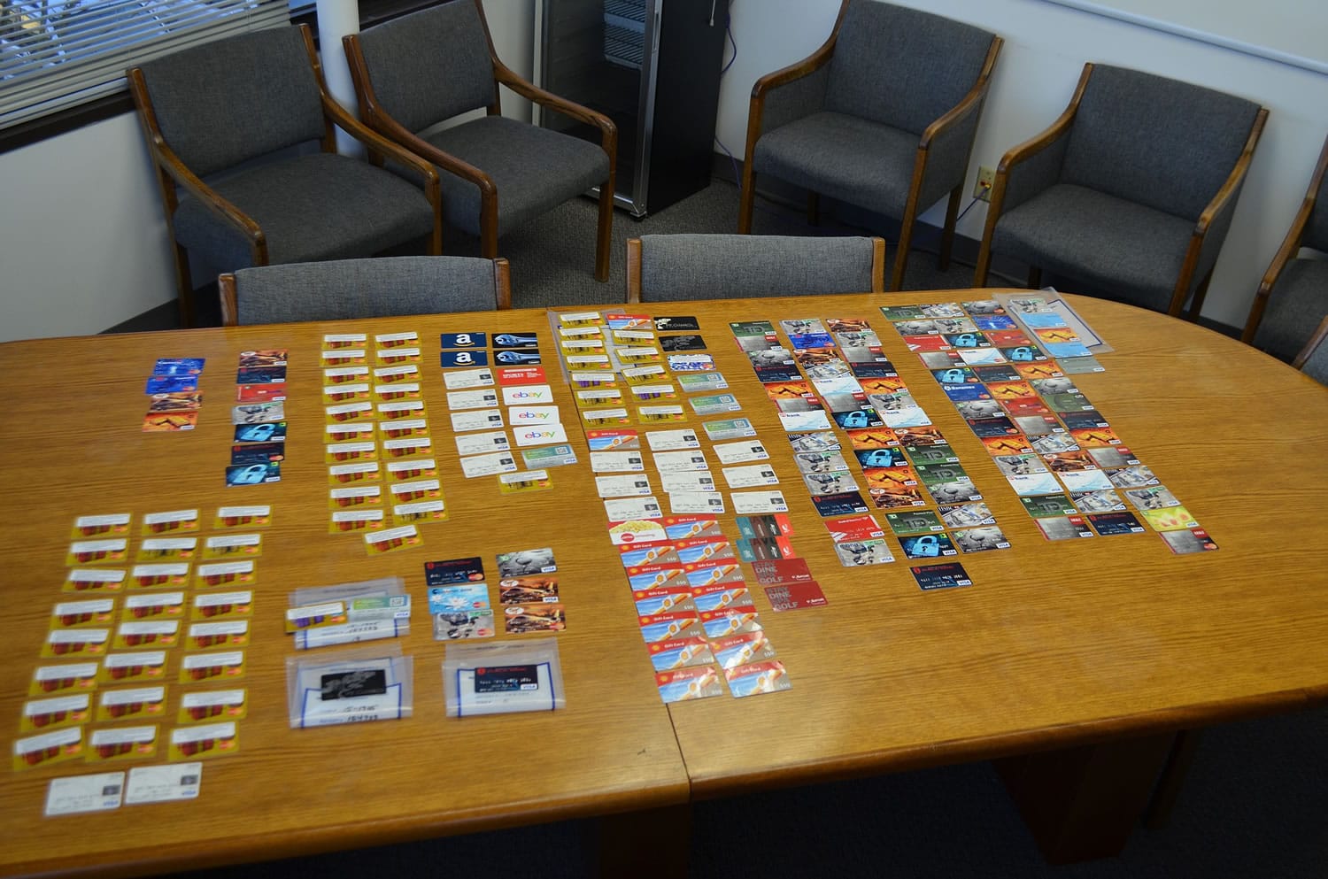 Some of the evidence seized as part of an investigation into a counterfeit credit card ring is shown in this photo provided by Beaverton, Ore.