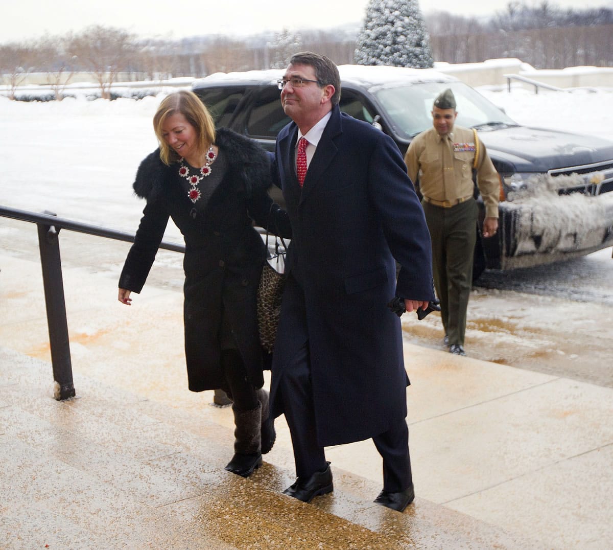 Incoming Defense Secretary Ash Carter, and his wife, Stephanie Carter, arrive at the Pentagon in Washington on Tuesday. Carter, who previously served as the No.