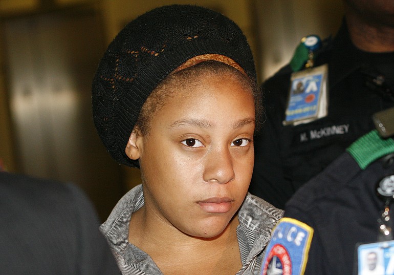 Jakadrien Turner, 15, arrives Friday at DFW Airport in Fort Worth, Texas. Turner was  deported to Colombia in May after, Immigration and Customs Enforcement says, she claimed to be a Colombian woman named Tika Lanay Cortez, 21, when she was arrested in April for theft by Houston Police.