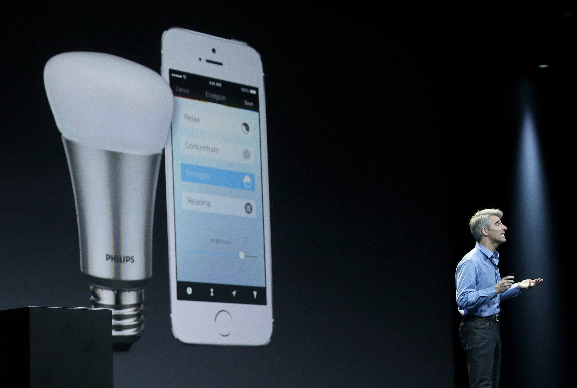 Associated Press files
Apple senior vice president of software engineering Craig Federighi speaks about the Apple HomeKit app June 2 at the Apple Worldwide Developers Conference in San Francisco.