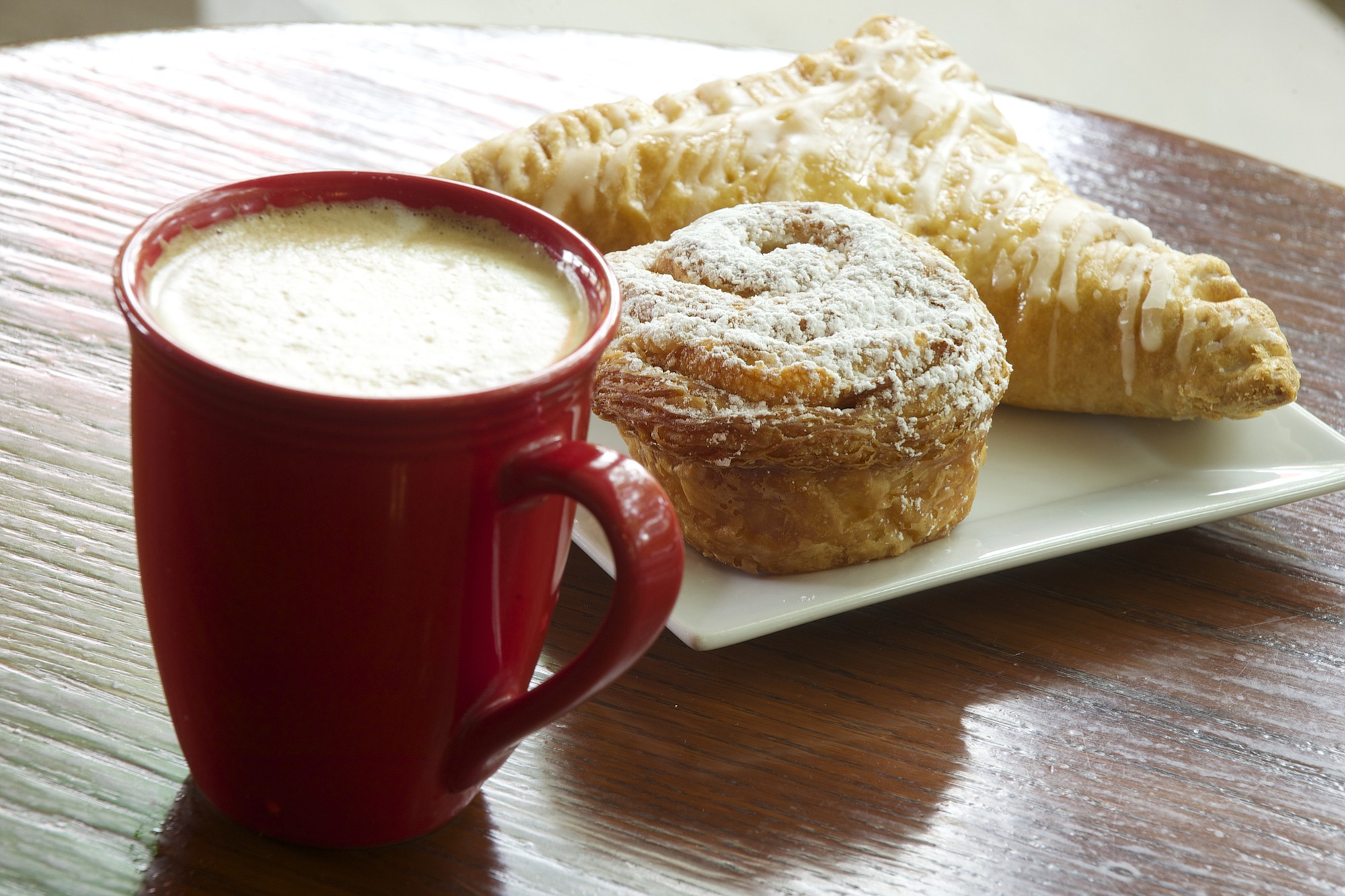 Meredine bun, apple turnover and a latte at Caffe Piccolo.