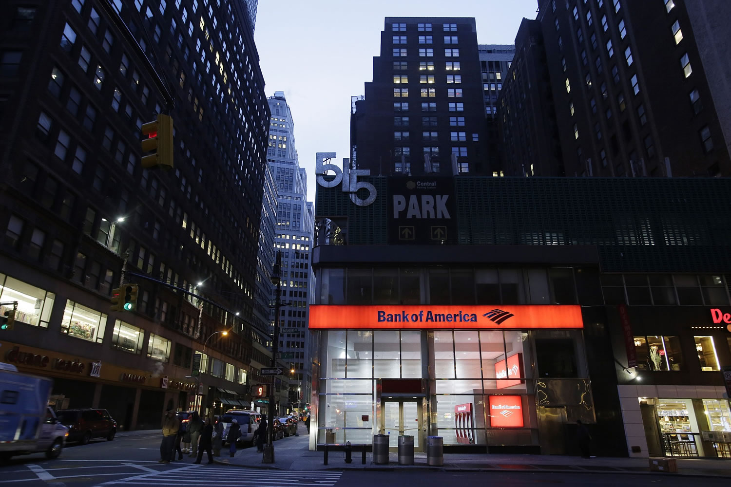 People walk past a branch of Bank of America on Wednesday in New York.