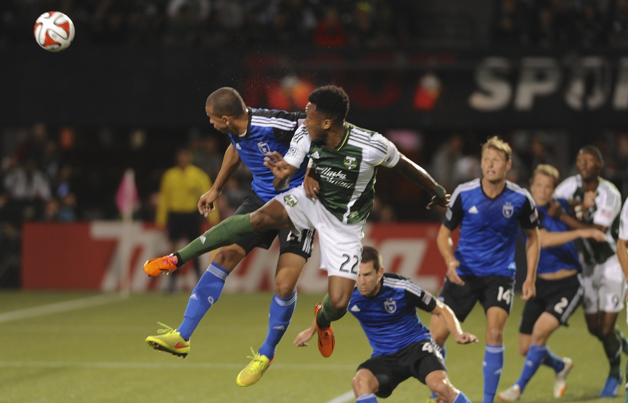 San Jose Earthquakes' Jason Hernandez defends against a shot by Portland Timbers' Rodney Wallace (22) during the first half of an MLS Soccer game in Portland, Ore., Wednesday Oct. 8, 2014.