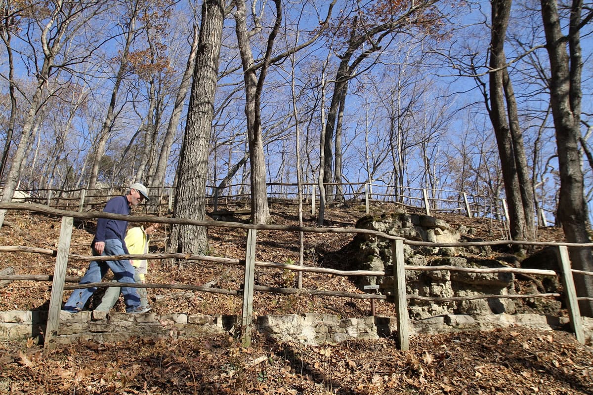 Paul and Sue Schramm, of Dyersville, Iowa, hike one of the trails at Effigy Mounds National Monument in Harpers Ferry, Iowa.