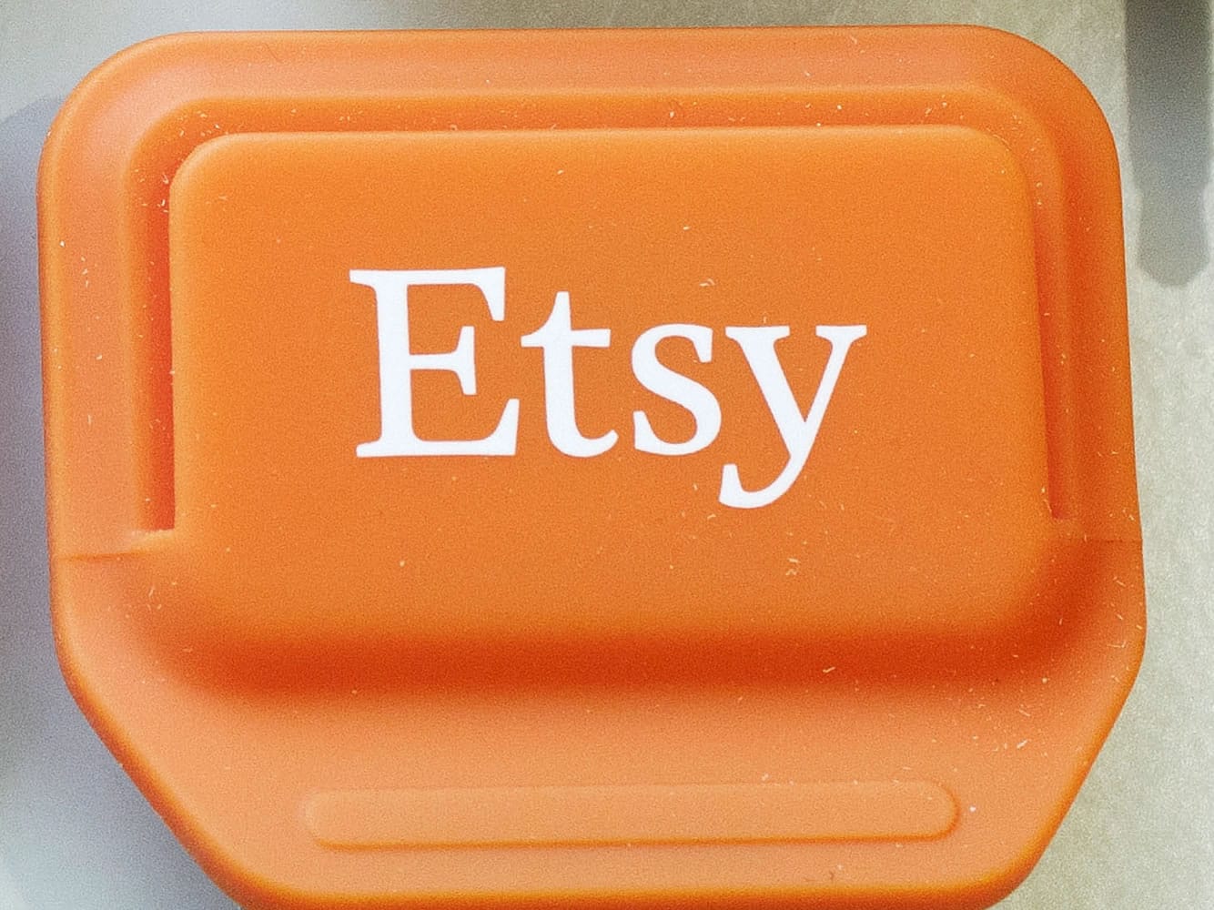 This Tuesday, Jan. 6, 2015 photo shows an Etsy mobile credit card reader, in New York. If craft seller Etsy goes public later this year it will be a test of how well the company can balance an explicit social mission with shareholder expectations for making money.