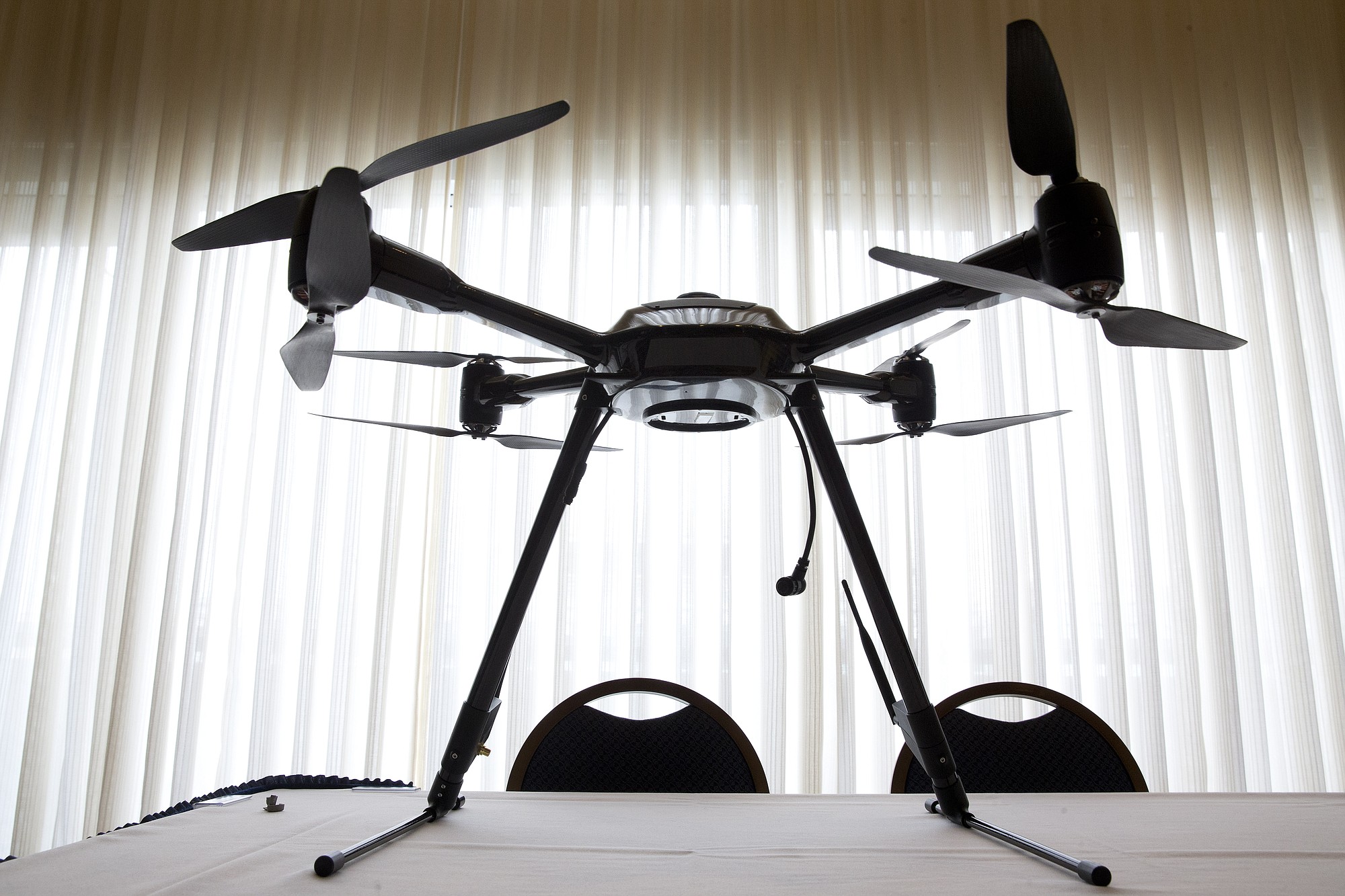 The Aerialtronics Altura Zenith drone is seen last month at an event at the National Press Club in Washington. An economic analysis by the Federal Aviation Administration indicates the agency, citing economic and safety benefits, is seeking regulations largely favorable to companies that want to use small drones.