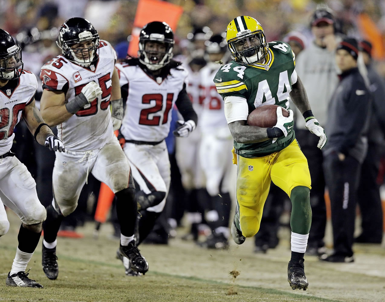 Green Bay Packers' James Starks (44) breaks away for a 41-yard run during the second half against the Atlanta Falcons on Monday, Dec. 8, 2014, in Green Bay, Wis. The Packers won 43-37.
