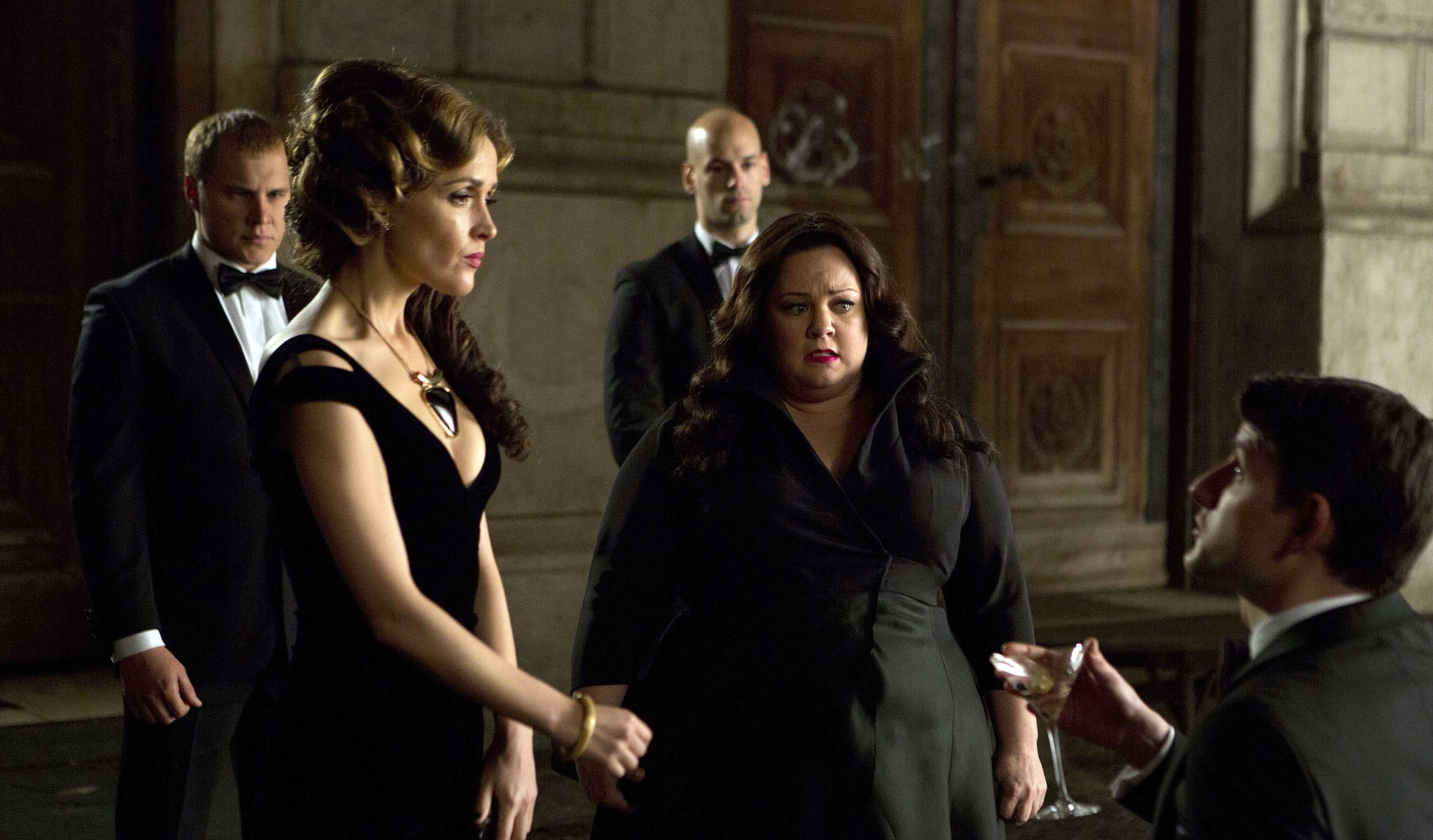 Melissa McCarthy, second from right, infiltrates an arms dealing ring led by Rose Byrne, left, in &quot;Spy.&quot;