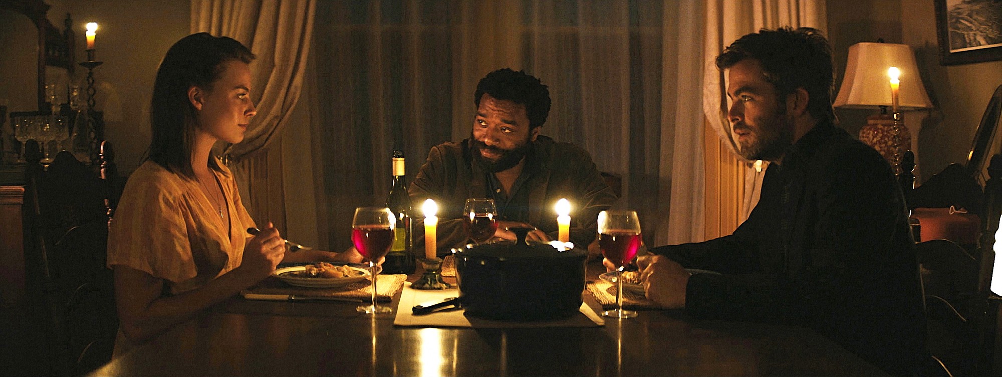 Margot Robbie, from left, as Ann Burden, Chiwetel Ejiofor as Loomis, and Chris Pine as Caleb, in the film &quot;Z for Zachariah.&quot;