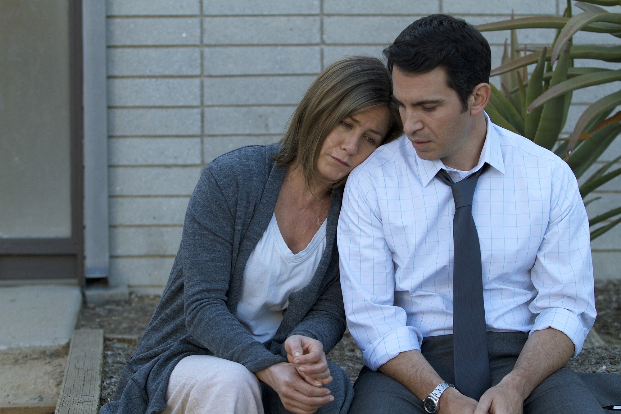 Jennifer Aniston and Chris Messina play former spouses in &quot;Cake.&quot;