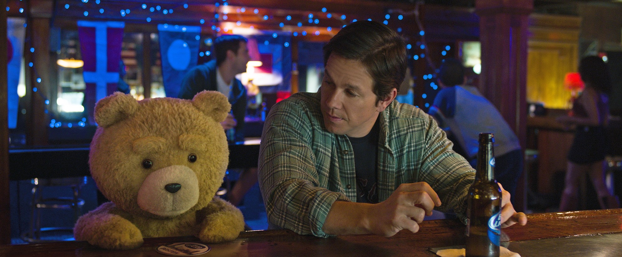 Universal Pictures
Ted, voiced by Seth MacFarlane, left, and Mark Wahlberg grab a beer at a bar in &quot;Ted 2.&quot;