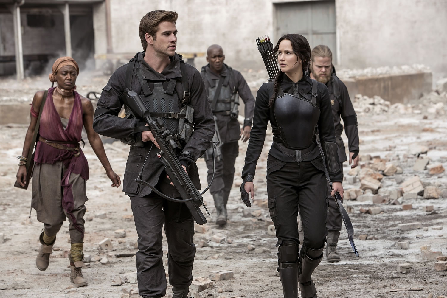 Liam Hemsworth as Gale Hawthorne and Jennifer Lawrence as Katniss Everdeen reprise their roles in &quot;The Hunger Games: Mockingjay -- Part 1.&quot;