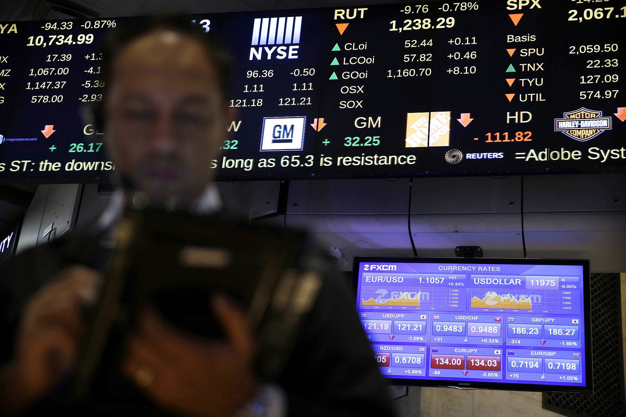Screens display financial information on the floor at the New York Stock Exchange in New York on Wednesday.