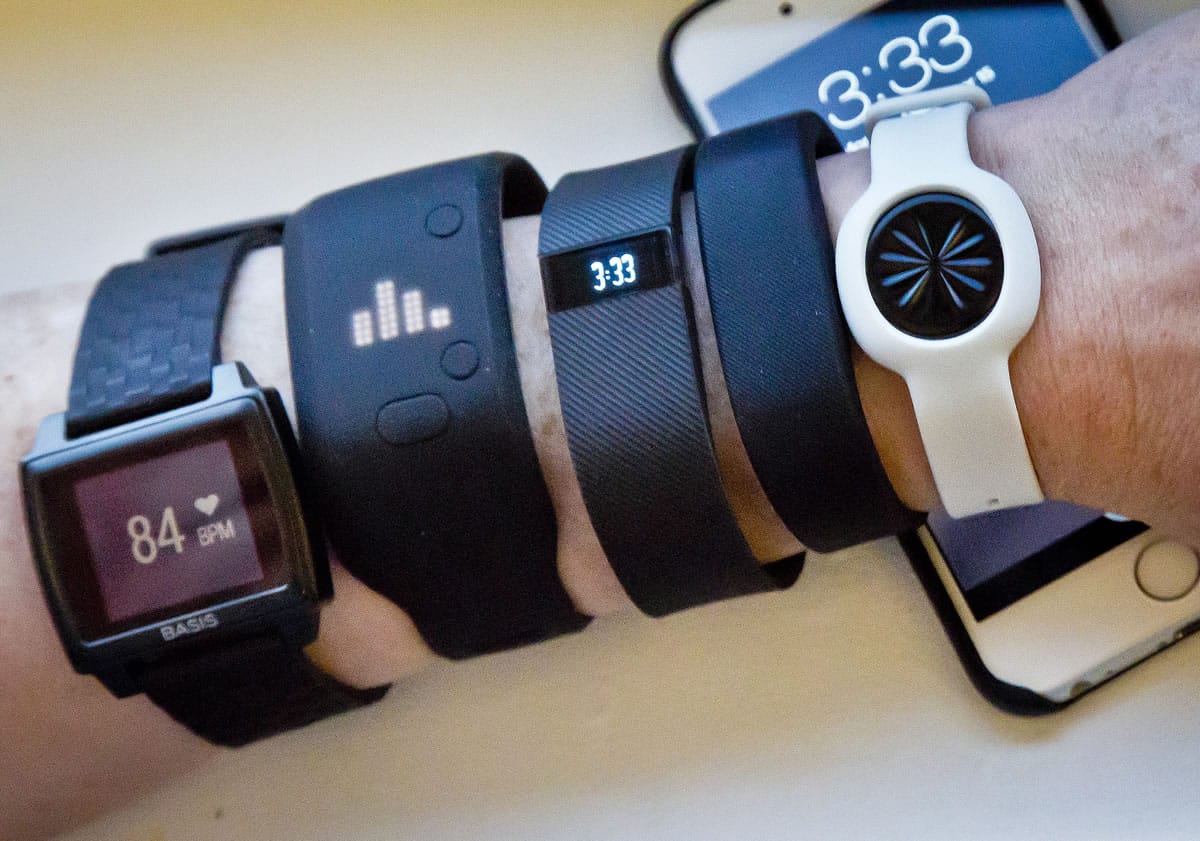 Fitness trackers, from left: Basis Peak, Adidas Fit Smart, Fitbit Charge, Sony SmartBand and Jawbone Move.