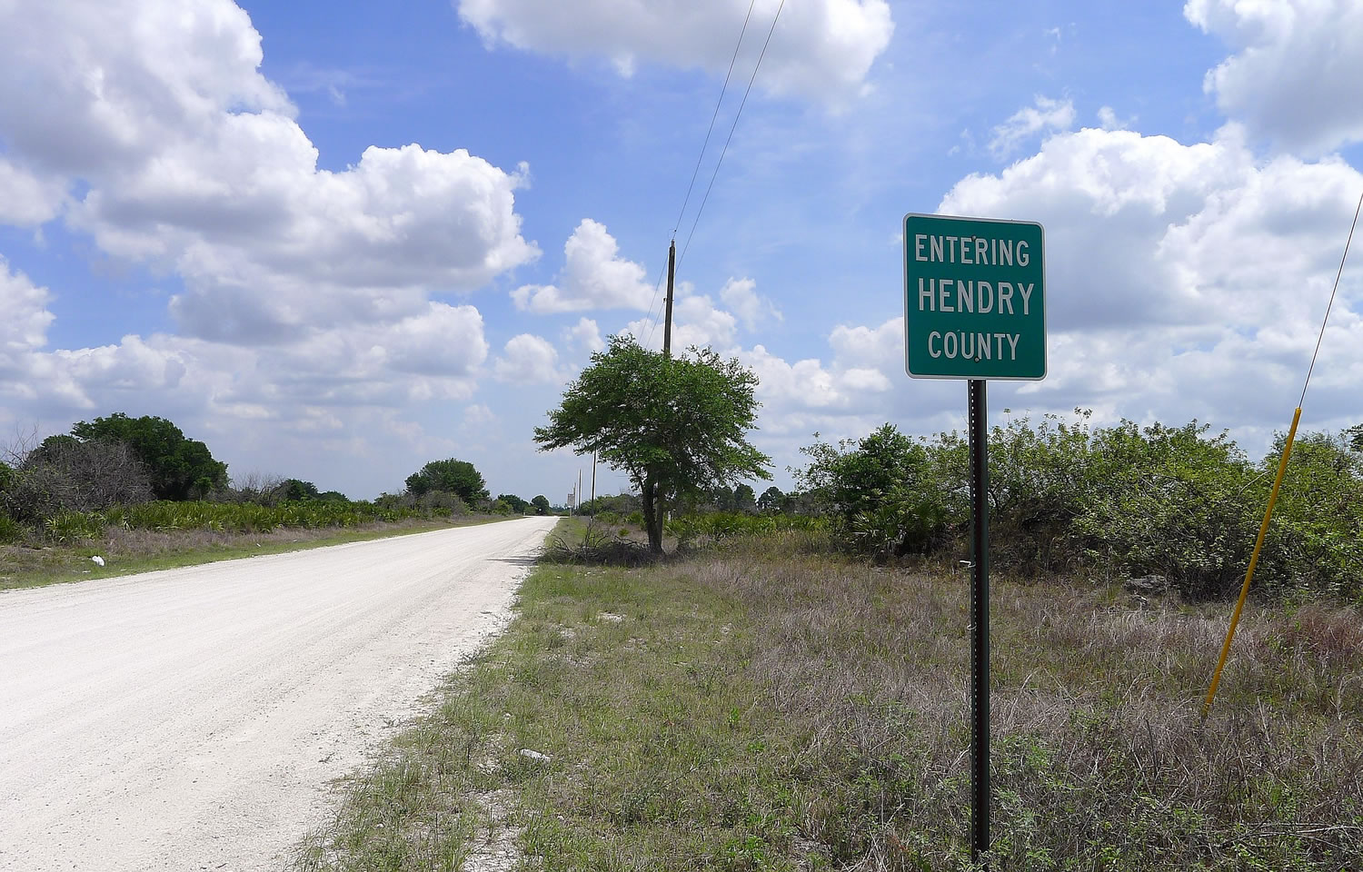 A marker identifying the Hendry County line in Florida.