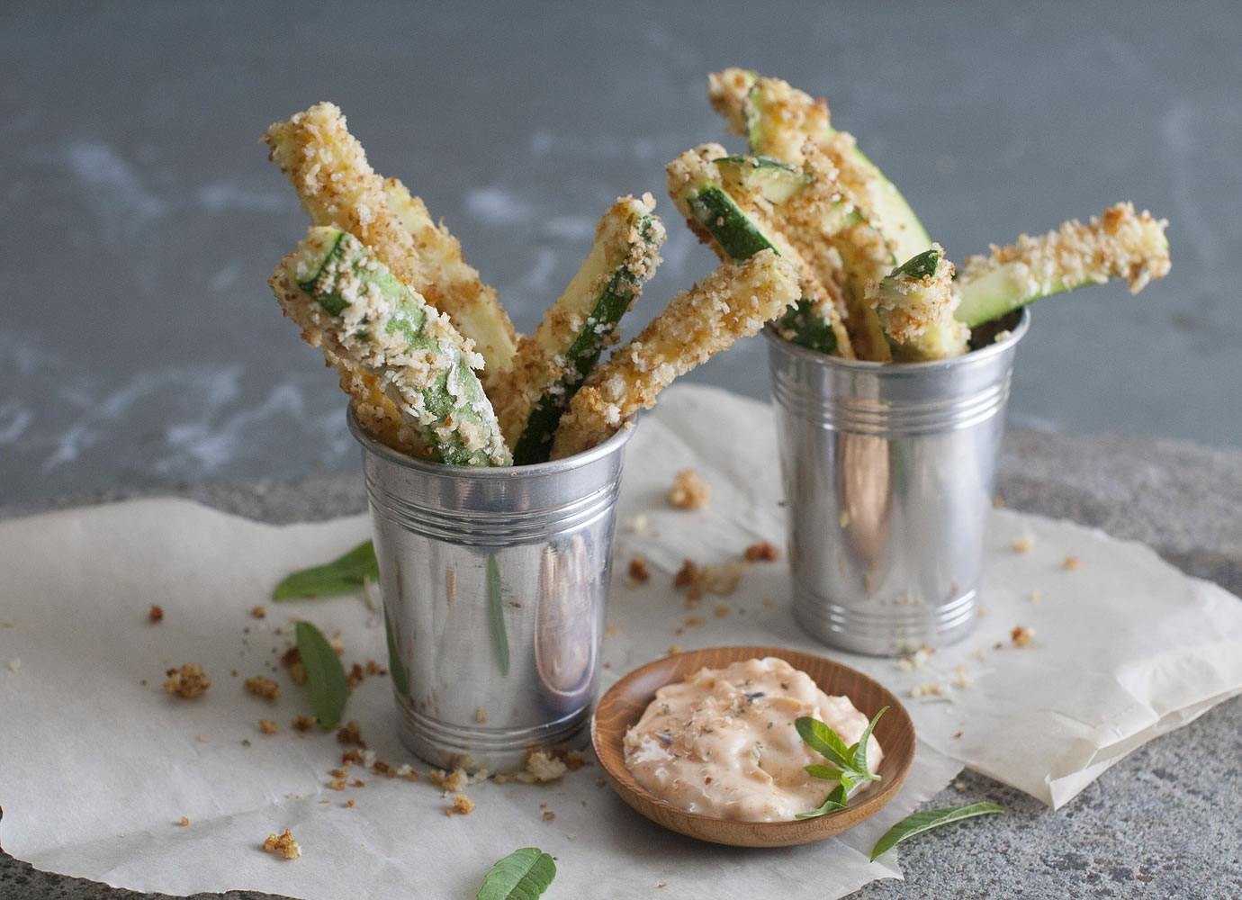 Cheesy zucchini fries with paprika dipping sauce.
