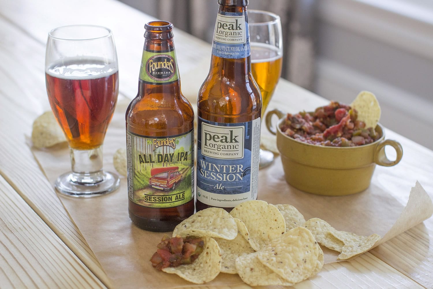 Lower alcohol craft beers include Founders All Day IPA and Peak Organic Winter Session Ale.