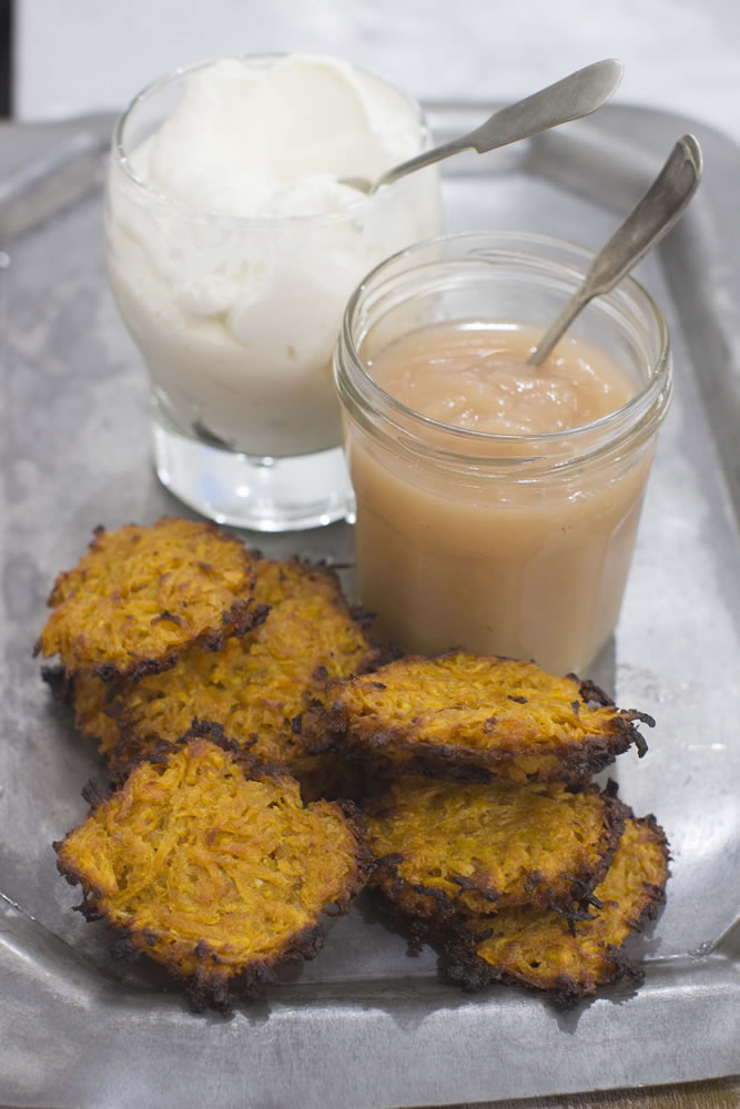 Sweet Potato Latkes are delicious and crispy and perfect accompanied by unsweetened applesauce and plain Greek yogurt or sour cream.