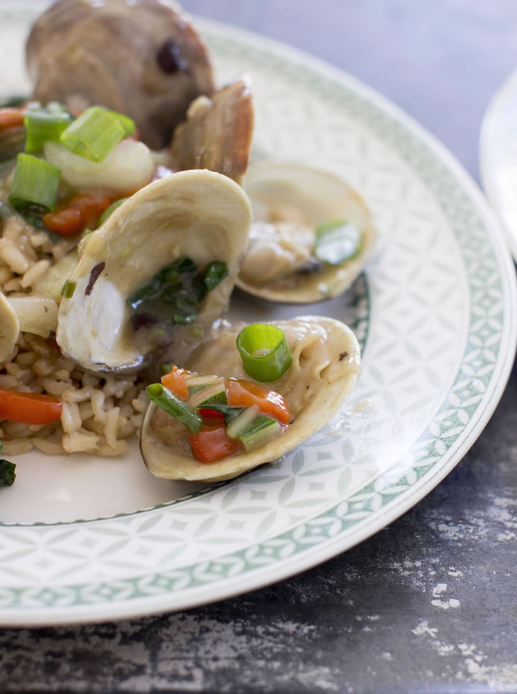 Clams are one of several round foods -- shaped like coins, that is -- that symbolize prosperity for the new year.