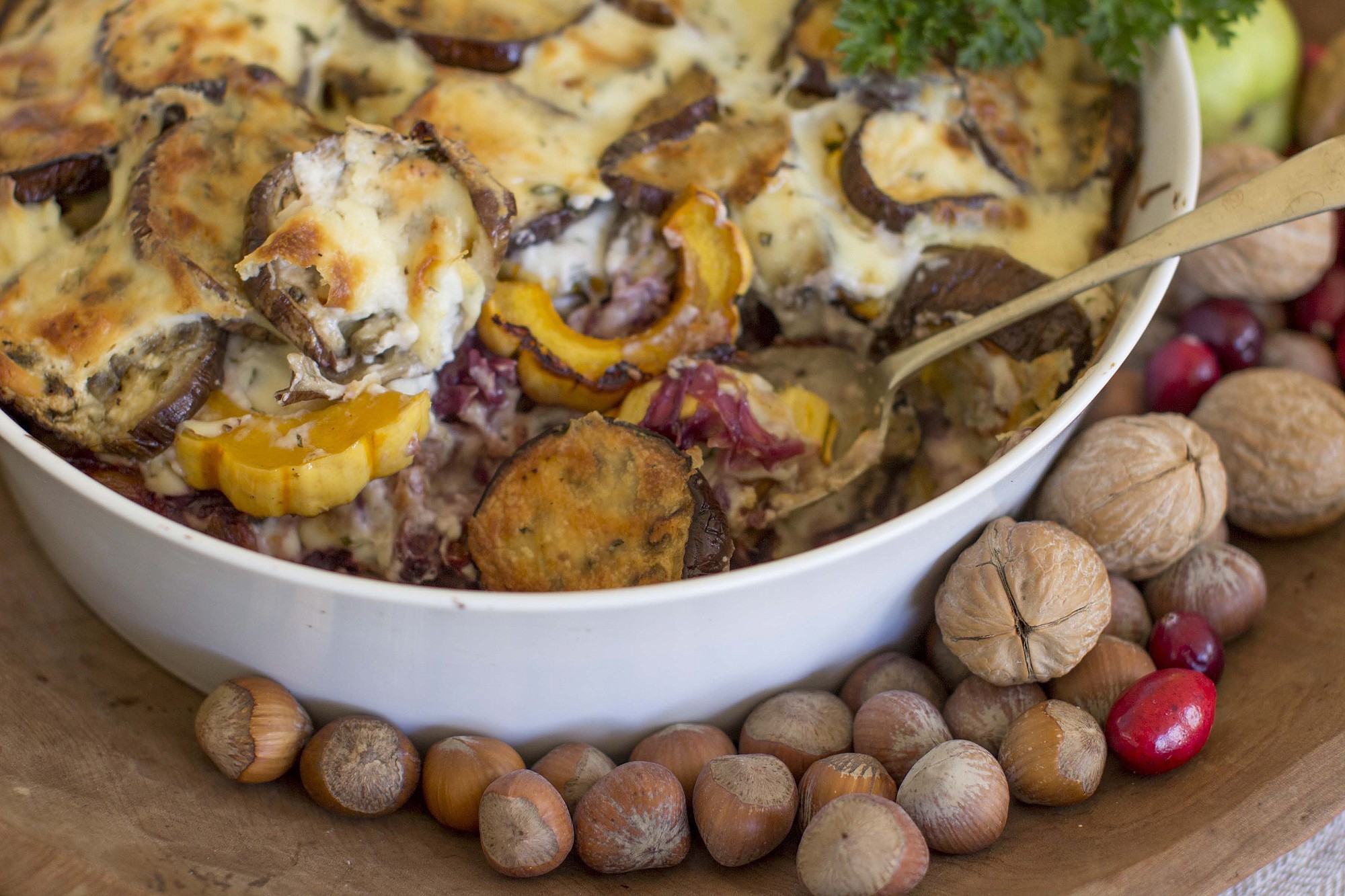 The deliciously creamy strata marries layers of roasted eggplant, delicata squash and red cabbage with bechamel sauce.