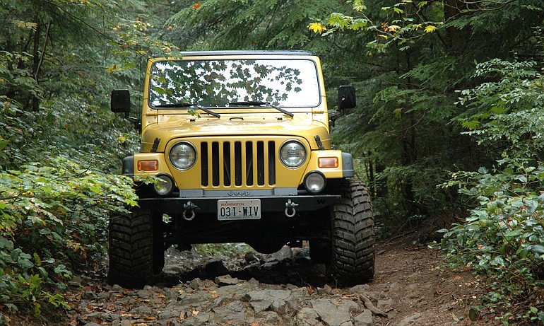 John Blake of Vancouver tests a off-road-vehicle route.