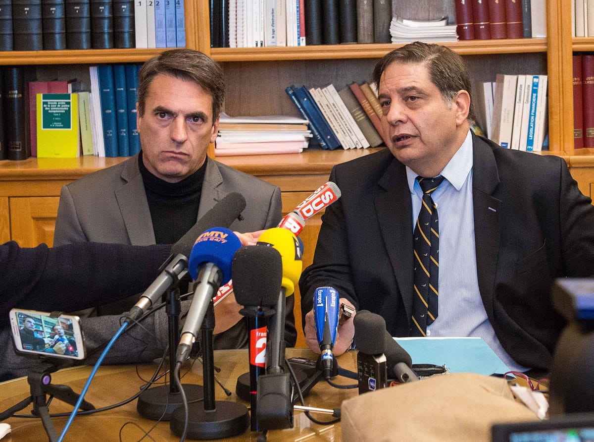Prosecutor Yvon Calvet, right, and a top police official in Montpellier, Gilles Souliers, address the media during a press conference held at the court house in Beziers, southern France on Tuesday.