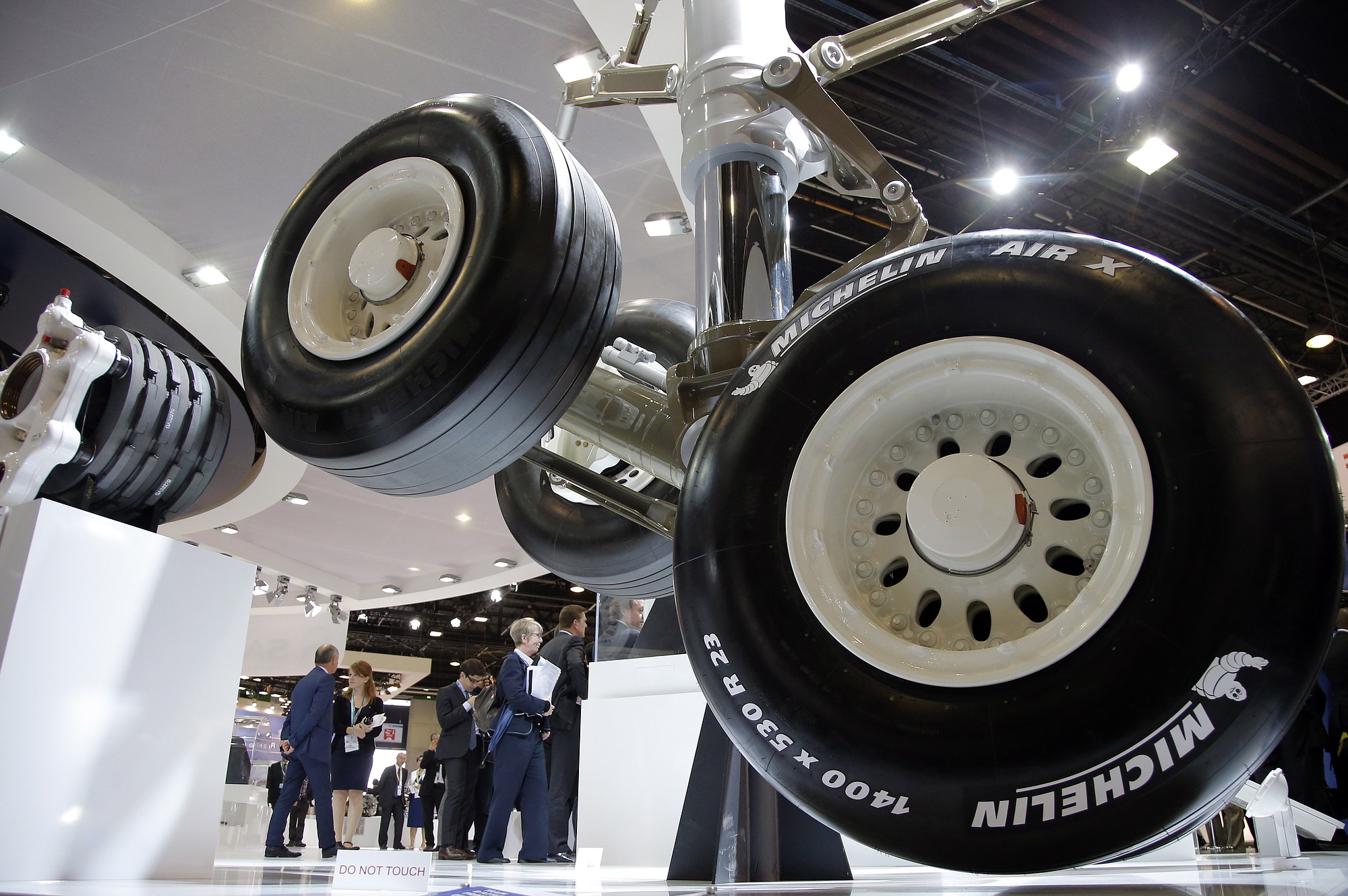 Visitors gather next to the Safran made landing gear of an Airbus A350 aircraft at the Paris Air Show on Thursday.