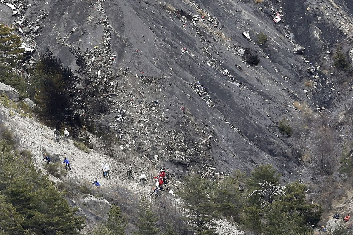 Rescue workers work at the plane crash site near Seyne-les-Alpes, France, on Wednesday after a Germanwings jetliner crashed Tuesday in the French Alps.