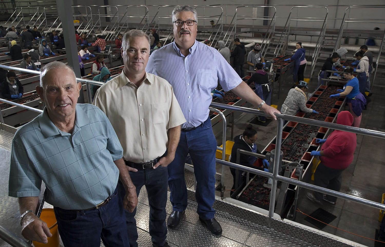 Father's Day often takes on extra meanings in family businesses. Marty Vebrugge, left, and his son Peter, center, have hired Dean Gardner as the CEO of their Wapato family produce business to steer Valley Fruit through future generational successions.