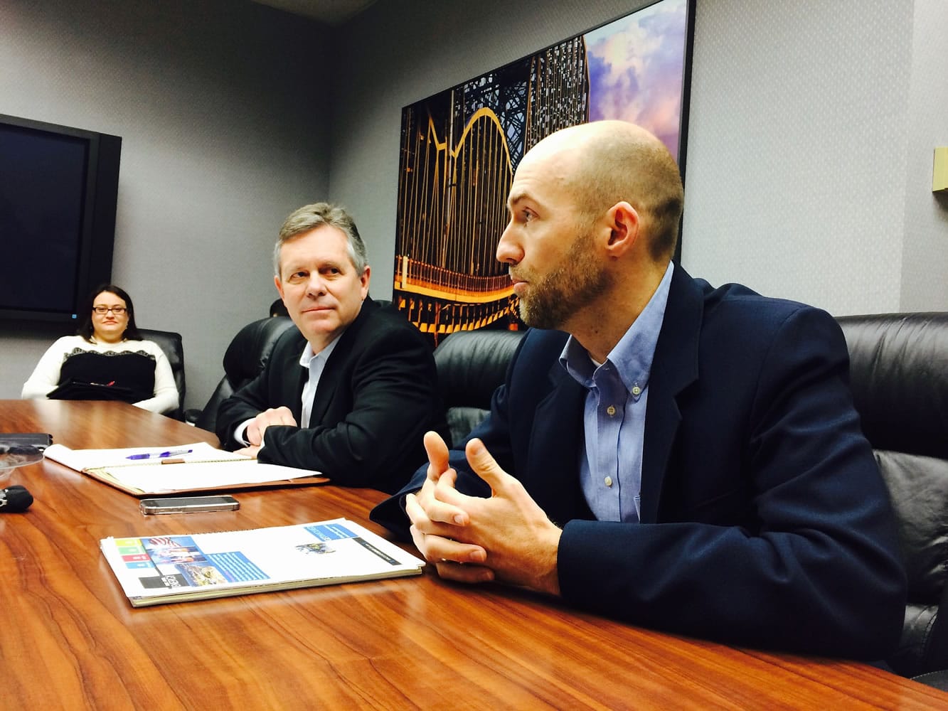 From left, Jennifer Minx, a spokeswoman for Tesoro, Dan Riley, vice president of government affairs for Tesoro, and Jared Larrabee, general manager of Vancouver Energy, visit The Columbian's editorial board.