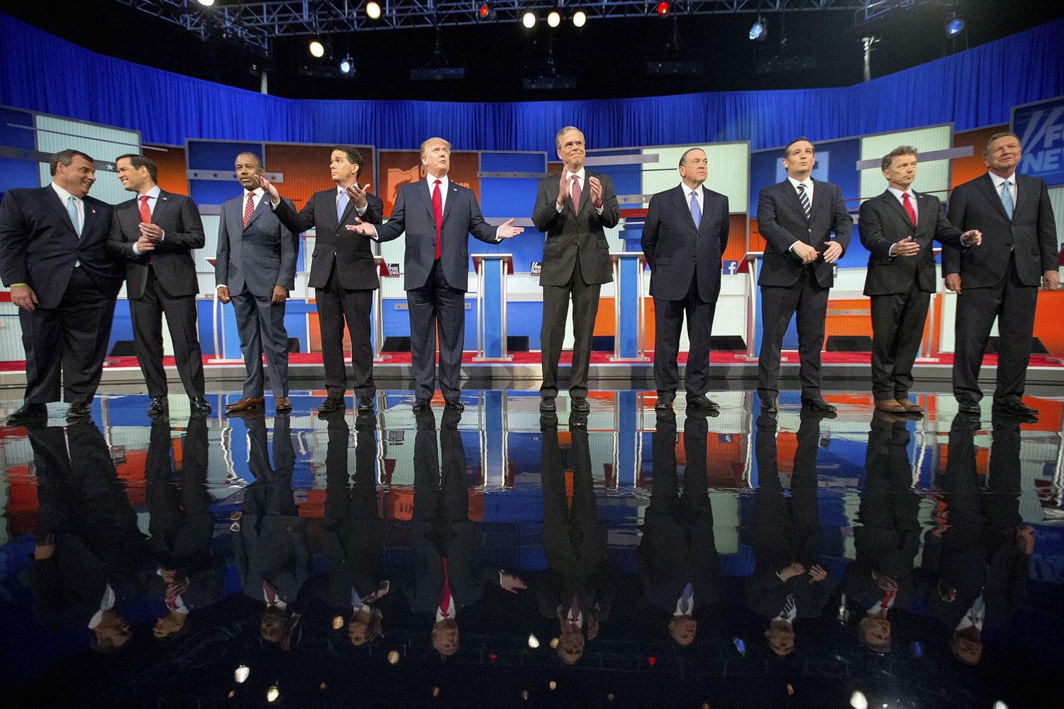 Republican presidential candidates from left, Chris Christie, Marco Rubio, Ben Carson, Scott Walker, Donald Trump, Jeb Bush, Mike Huckabee, Ted Cruz, Rand Paul, and John Kasich take the stage Thursday in Cleveland.