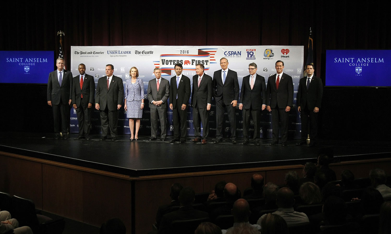 Republican presidential candidates -- Jeb Bush, from left, Ben Carson, Chris Christie, Carly Fiorina, Lindsey Graham, Bobby Jindal, John Kasich, George Pataki, Rick Perry, Rick Santorum and Scott Walker -- gather on stage Monday before a forum in Manchester, N.H.