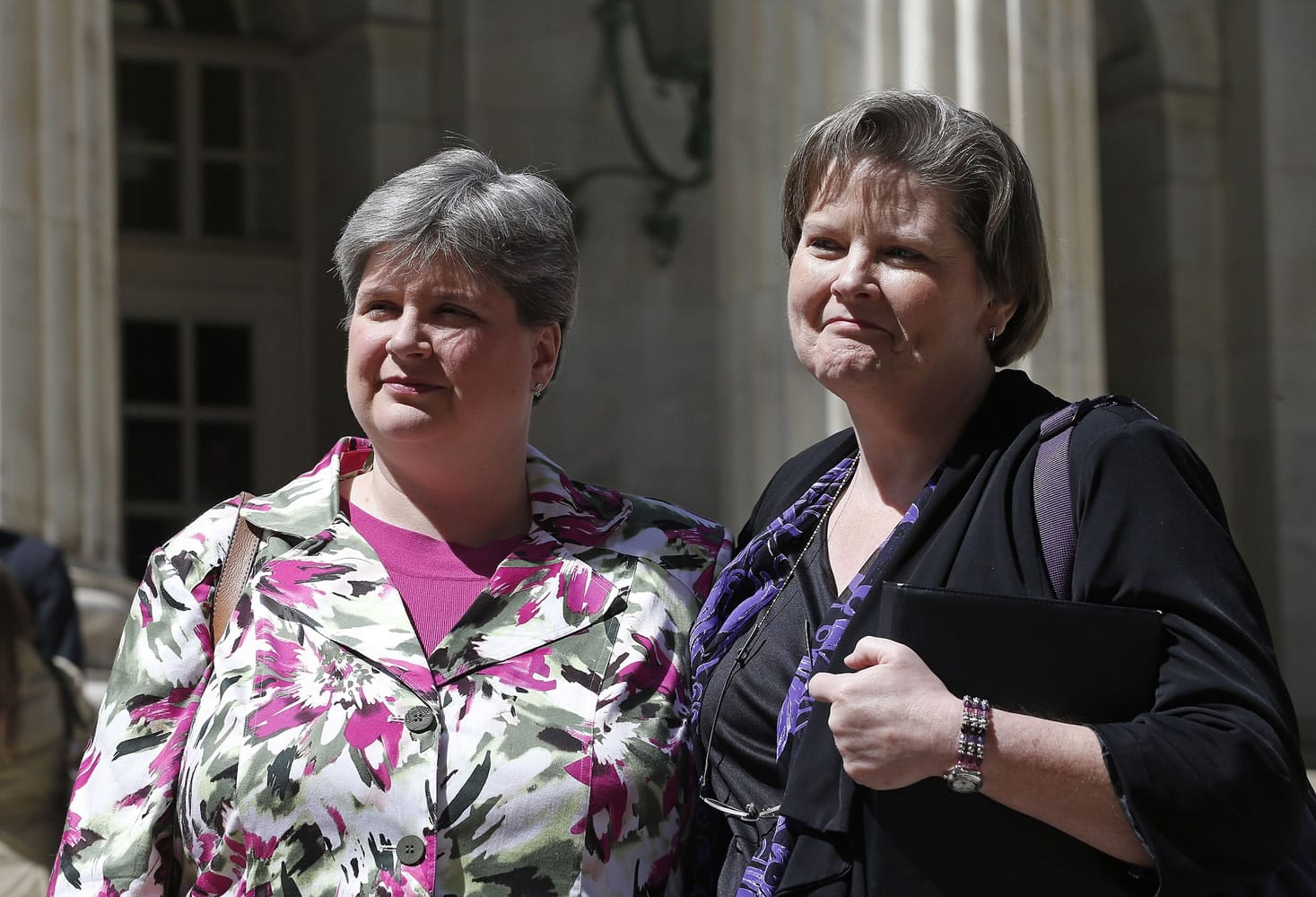 Plaintiffs challenging Oklahoma's gay marriage ban Sharon Baldwin, left, and her partner, Mary Bishop, leave court April 17 following a hearing at the 10th U.S. Circuit Court of Appeals in Denver. The three-judge panel of the 10th U.S. Circuit Court of Appeals in Denver today found a ban on same-sex marriage in Oklahoma violates the U.S. Constitution.