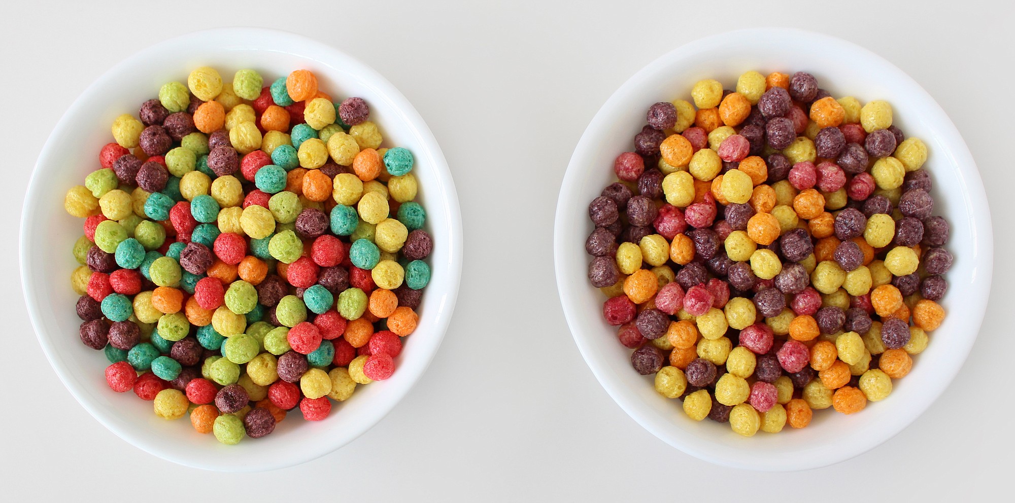 General Mills
A bowl of Trix cereal made with artificial colors and flavors, left, and a bowl of a reformulated version, made with natural flavors and colorings, right.