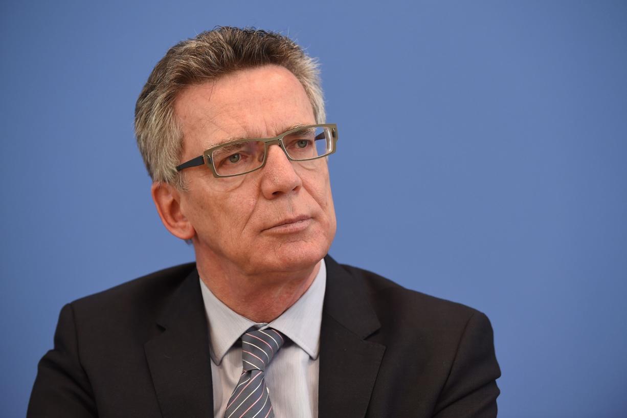 German Interior Minister Thomas de Maiziere attends a press conference in Berlin.