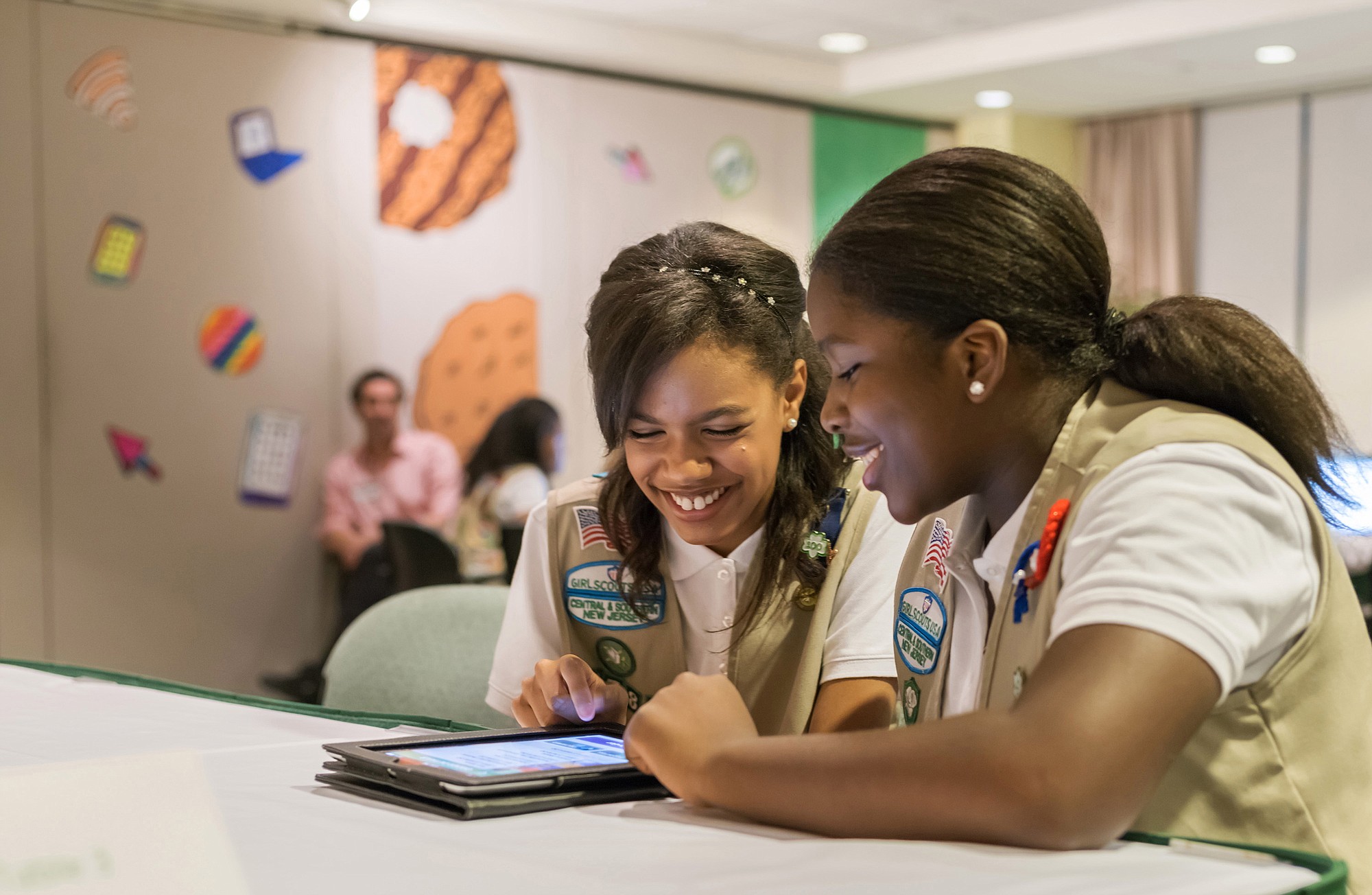 Girl Scouts of the USA
Girl Scouts Bria and Shirell practice selling cookies on one of two new digital platforms, as mobile apps and personalized websites are now allowed for sales.