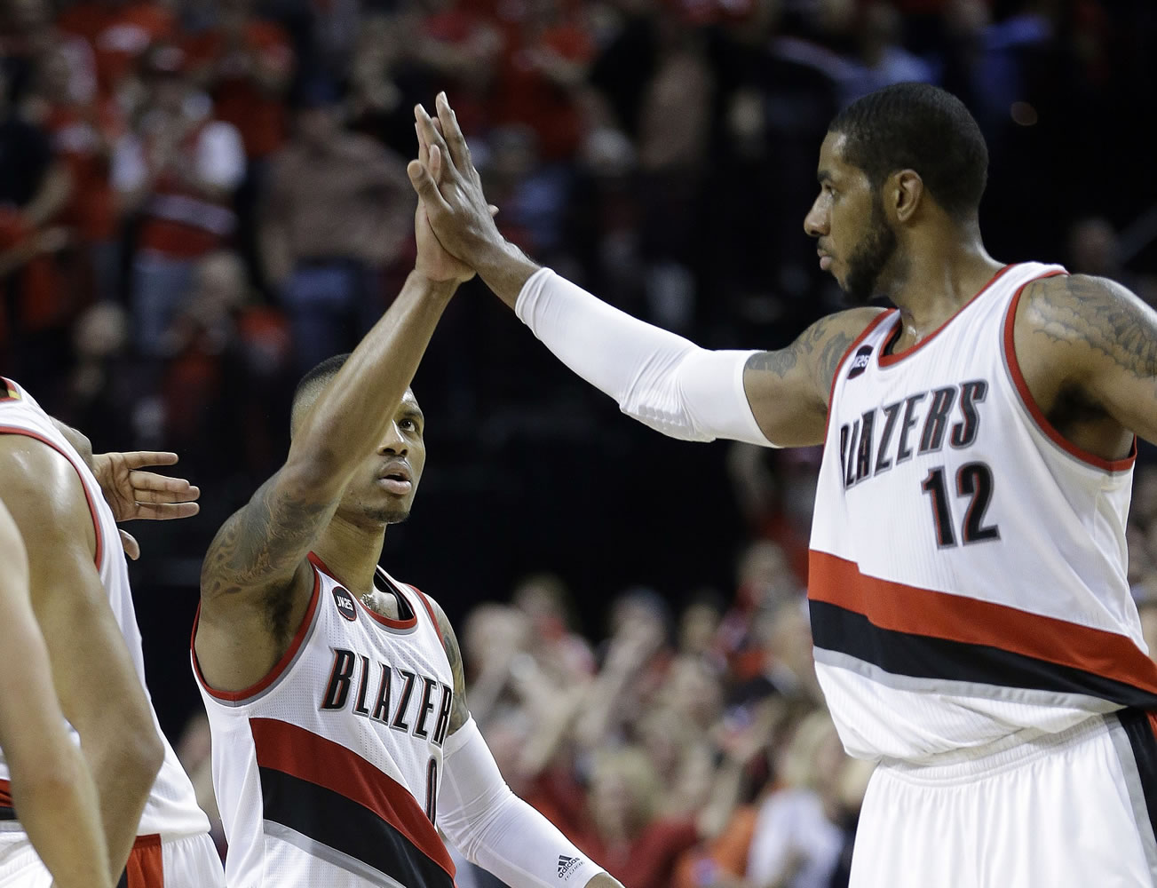 LaMarcus Aldridge, right, is handing off being the face of the Portland Trail Blazers to Damian Lillard, left.
