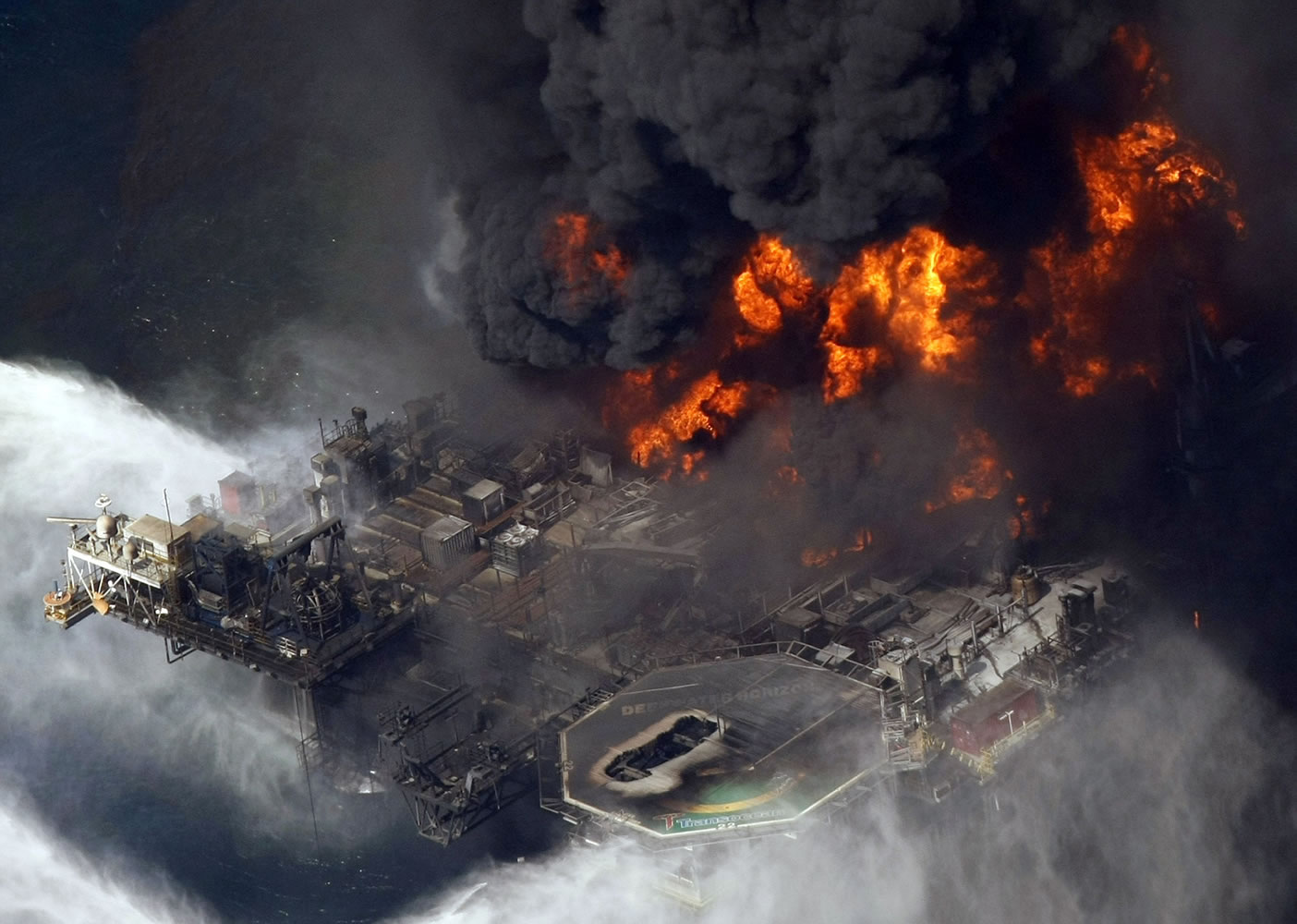 The Deepwater Horizon oil rig burns in 2010 in the Gulf of Mexico, more than 50 miles southeast of Venice, La.