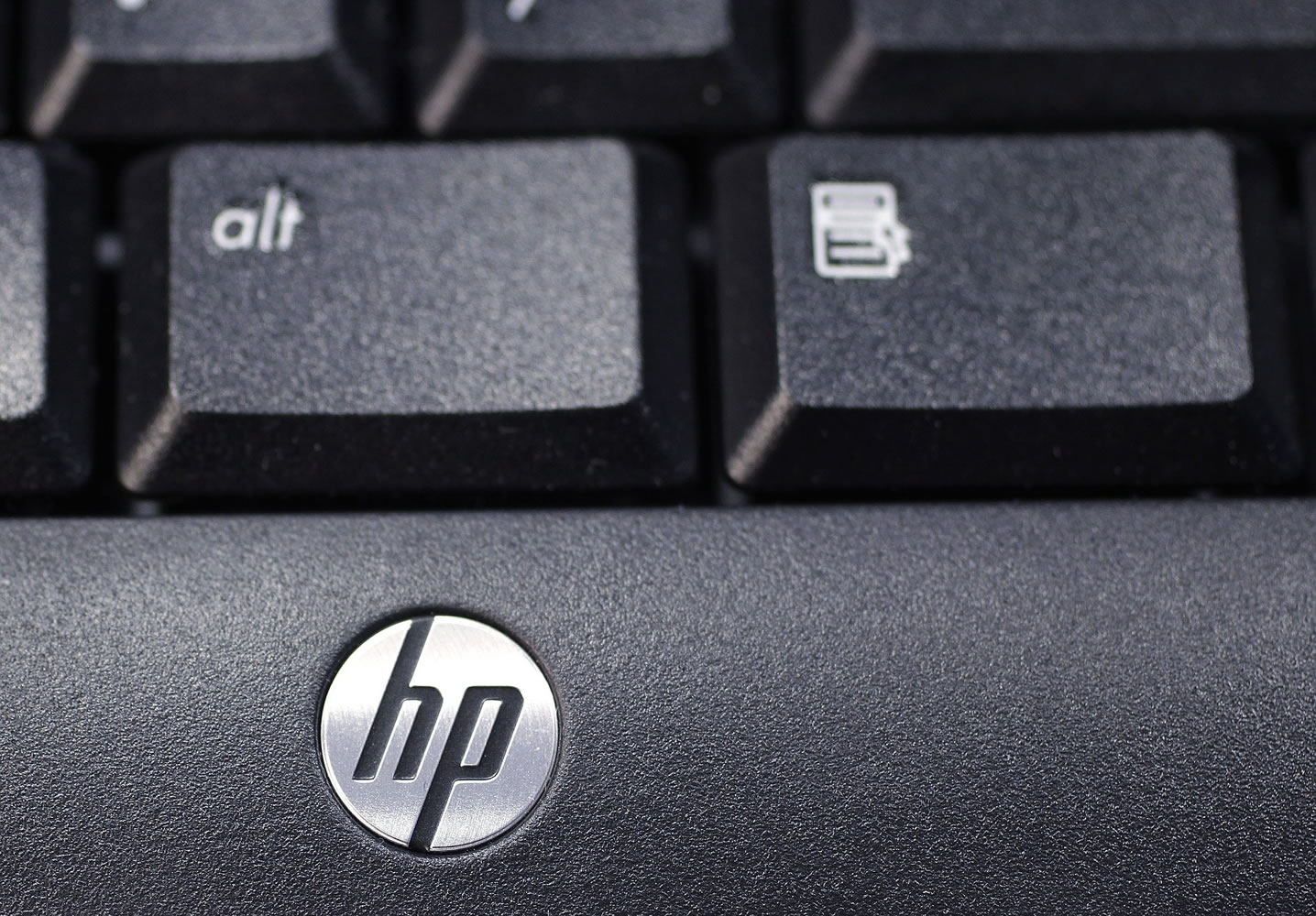 Associated Press files
The company logo on a Hewlett-Packard keyboard at the Micro Center computer store in Santa Clara, Calif.