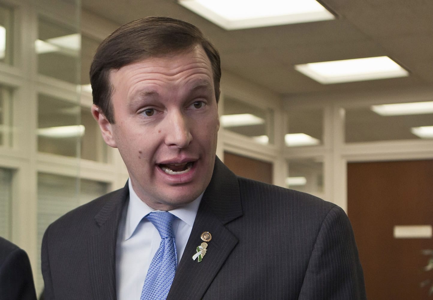 Sen. Chris Murphy, D-Conn. speaks to reporters April 9, 2014on Capitol Hill in Washington. The party that wins the impending Supreme Court decision on President Barack Obama?s health care law could be the political loser.