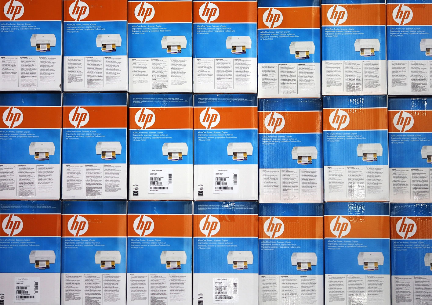 Hewlett-Packard printers are stacked on the shelf of a Best Buy store in Seekonk, Mass.