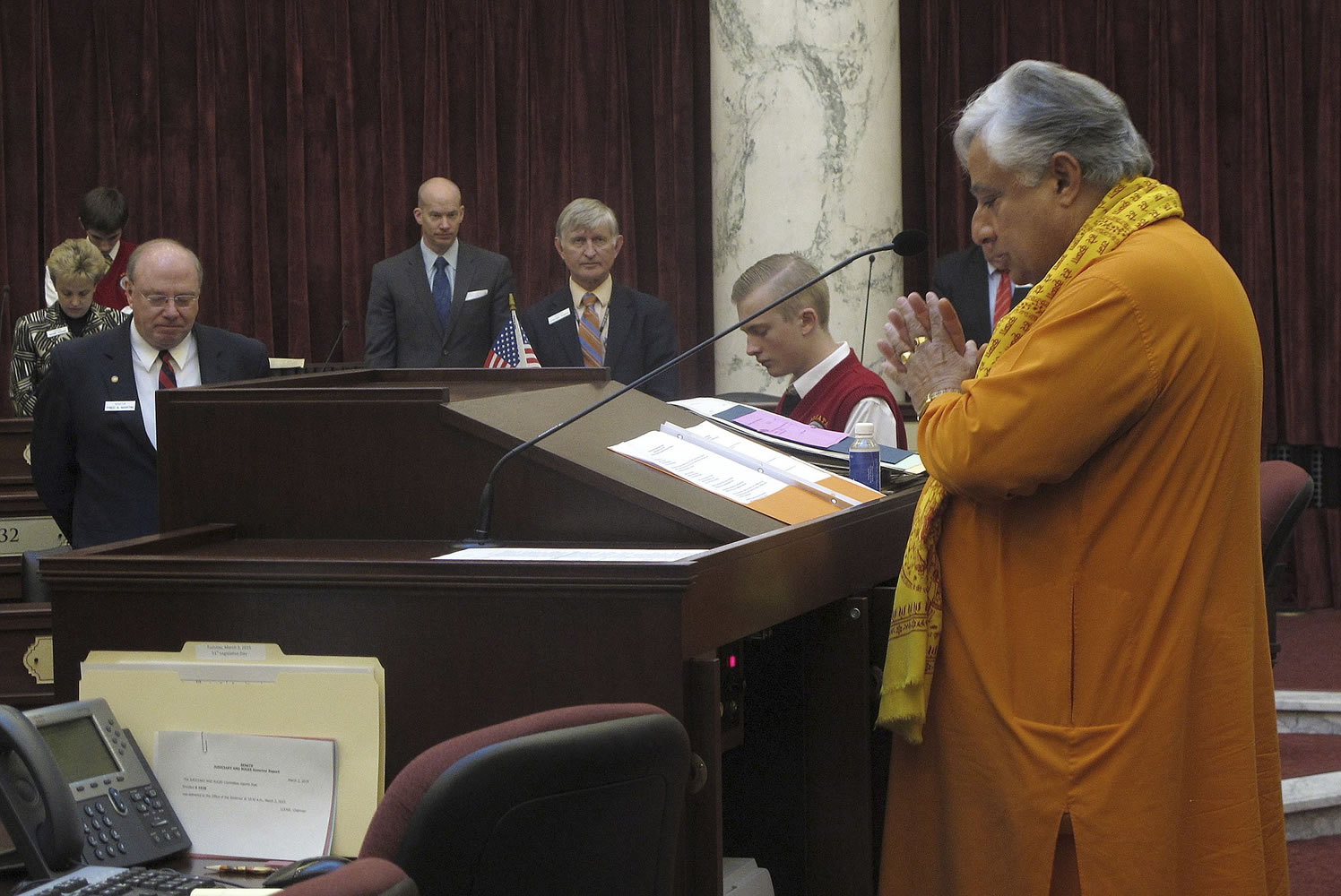 Rajan Zed, right, delivers a Hindu prayer in front of the Idaho Senate on Tuesday in Boise.