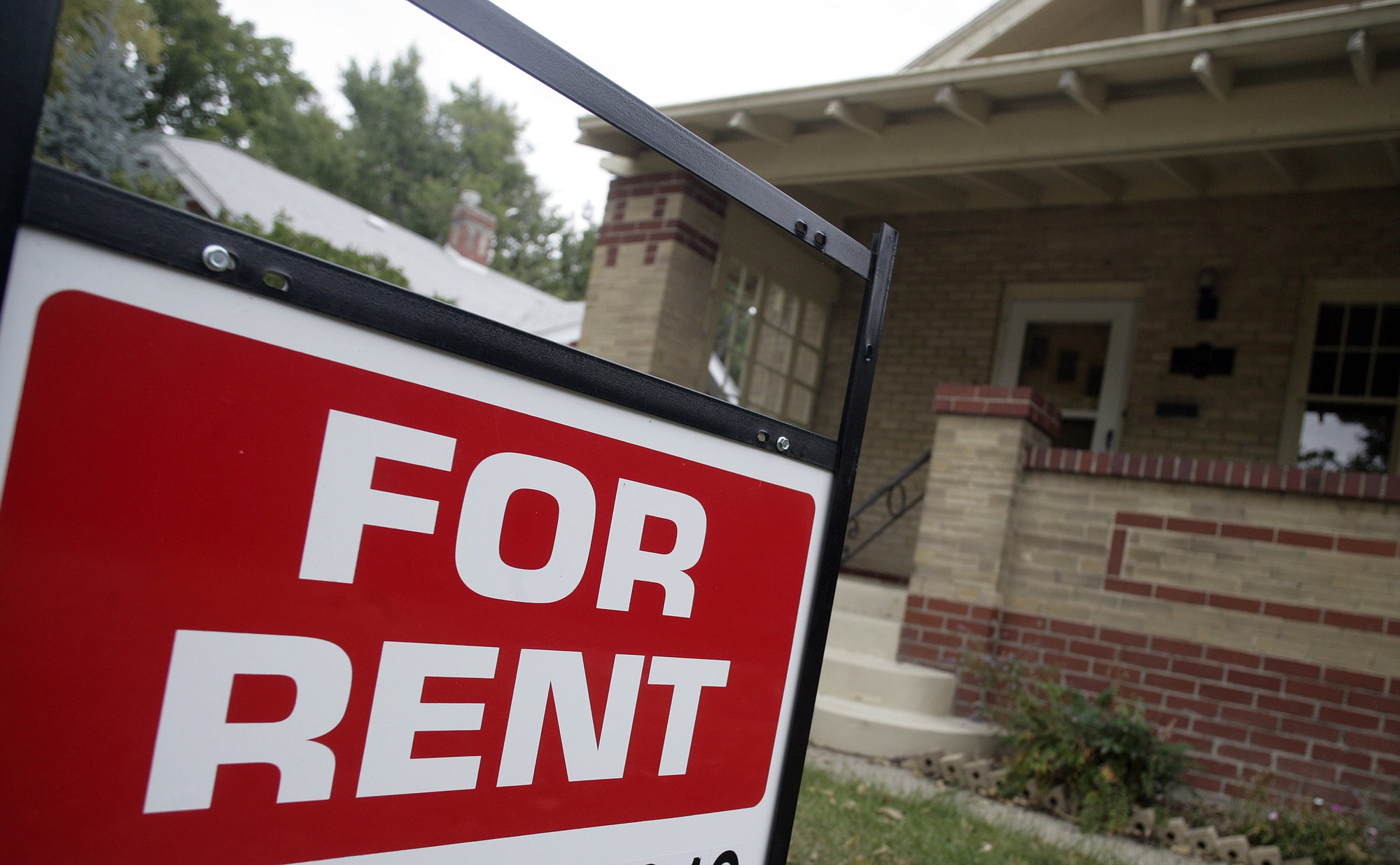 A &quot;for rent&quot; sign is posted outside a home in Denver. Real estate data firm Zillow reports on U.S.