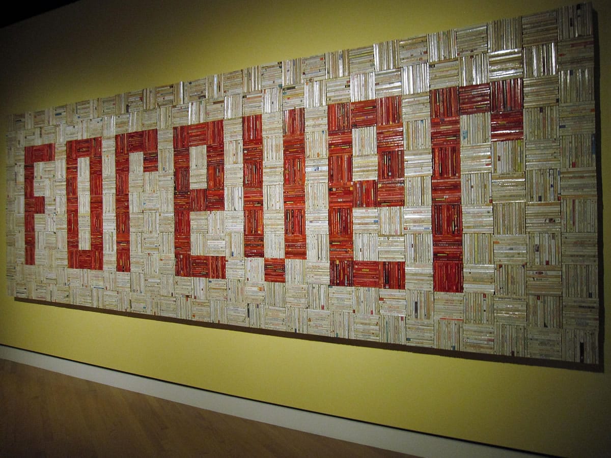 A solid wall of 4,000 paperback romance novels spelling out the word &quot;FOREVER&quot; in an art installation at Crystal Bridges Museum of American Art in Bentonville, Ark. The work by John Salvest was part of a major contemporary art show at the museum in late 2013.