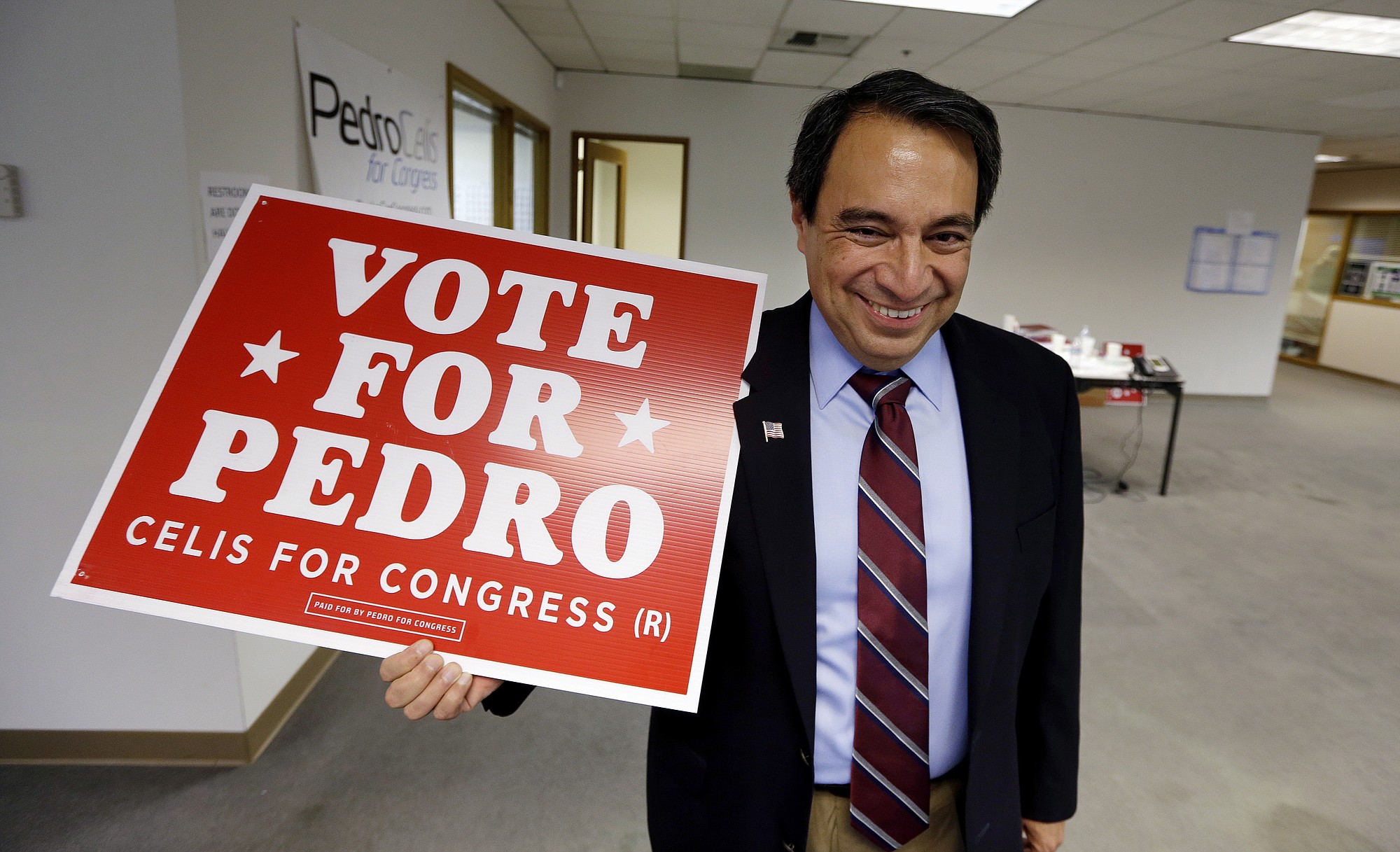Pedro Celis, a Republican candidate for Congress, poses for a photo in his campaign headquarters in Woodinville.