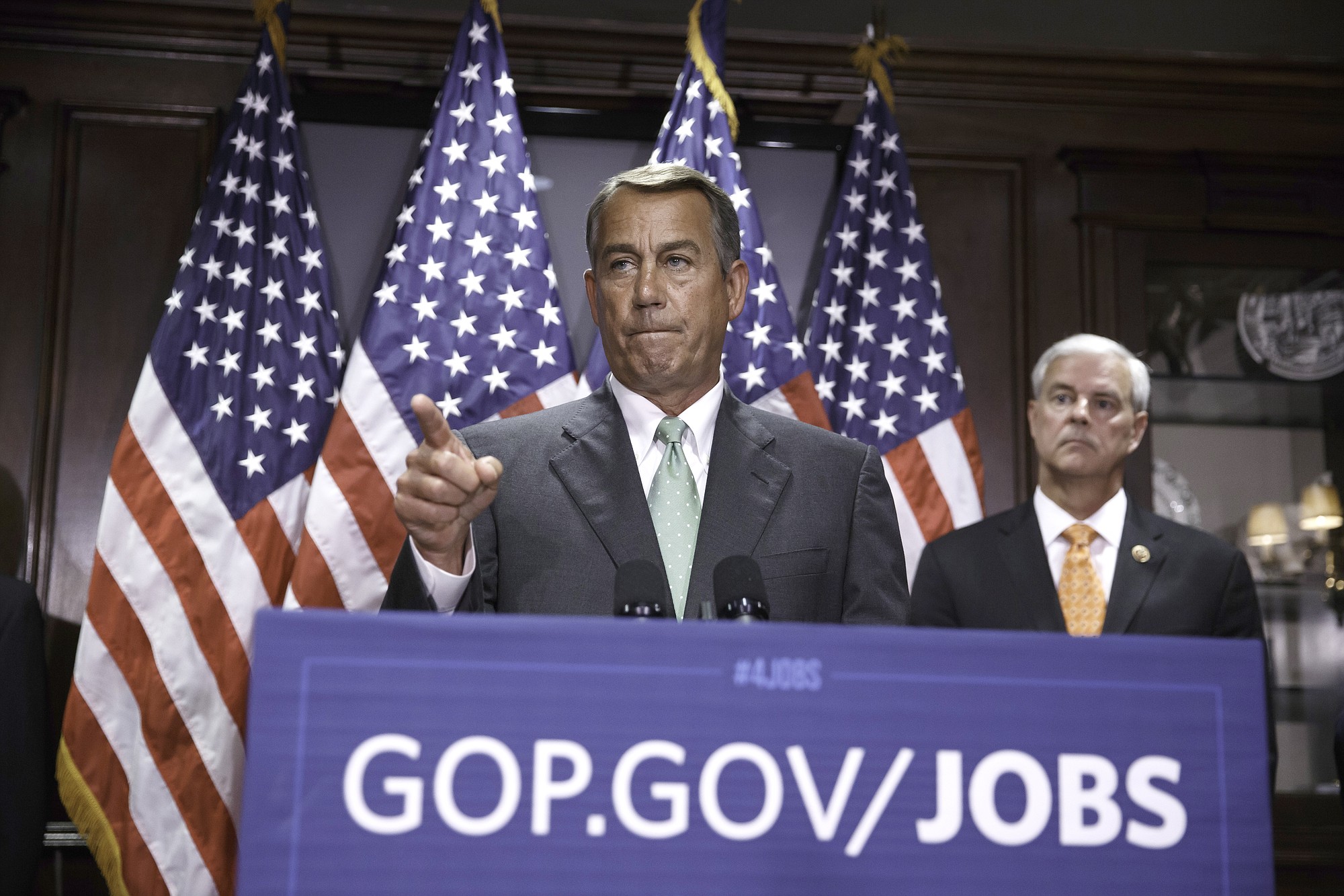 House Speaker John Boehner of Ohio, accompanied by Rep.